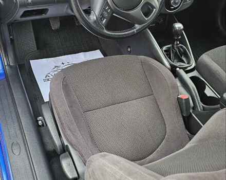 Синій Кіа Черато, об'ємом двигуна 1.59 л та пробігом 88 тис. км за 8400 $, фото 10 на Automoto.ua