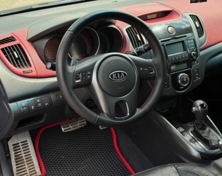Синій Кіа Черато, об'ємом двигуна 2 л та пробігом 225 тис. км за 6400 $, фото 7 на Automoto.ua