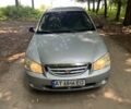 Синій Кіа Черато, об'ємом двигуна 1.6 л та пробігом 255 тис. км за 2700 $, фото 1 на Automoto.ua