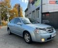 Синій Кіа Черато, об'ємом двигуна 2 л та пробігом 194 тис. км за 4200 $, фото 1 на Automoto.ua