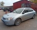 Синий Киа Черато, объемом двигателя 1.6 л и пробегом 195 тыс. км за 3000 $, фото 2 на Automoto.ua