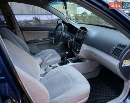 Синій Кіа Черато, об'ємом двигуна 1.6 л та пробігом 355 тис. км за 3400 $, фото 9 на Automoto.ua