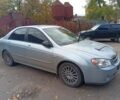 Синий Киа Черато, объемом двигателя 1.6 л и пробегом 195 тыс. км за 3000 $, фото 1 на Automoto.ua