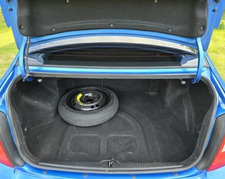 Синий Киа Черато, объемом двигателя 2 л и пробегом 258 тыс. км за 4750 $, фото 15 на Automoto.ua