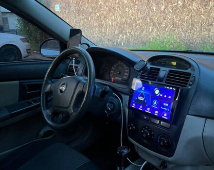 Синий Киа Черато, объемом двигателя 1.6 л и пробегом 370 тыс. км за 4600 $, фото 2 на Automoto.ua