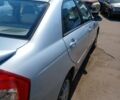 Синий Киа Черато, объемом двигателя 2 л и пробегом 240 тыс. км за 3500 $, фото 4 на Automoto.ua