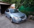 Синій Кіа Черато, об'ємом двигуна 2 л та пробігом 215 тис. км за 4200 $, фото 1 на Automoto.ua