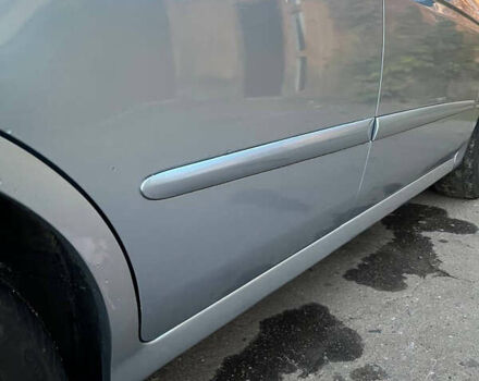 Синий Киа Черато, объемом двигателя 1.6 л и пробегом 370 тыс. км за 4600 $, фото 3 на Automoto.ua