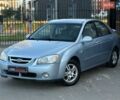 Синий Киа Черато, объемом двигателя 1.98 л и пробегом 200 тыс. км за 3450 $, фото 1 на Automoto.ua