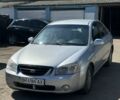 Синий Киа Черато, объемом двигателя 2 л и пробегом 300 тыс. км за 3300 $, фото 1 на Automoto.ua