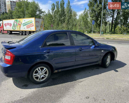Синий Киа Черато, объемом двигателя 1.6 л и пробегом 200 тыс. км за 2850 $, фото 6 на Automoto.ua