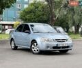 Синий Киа Черато, объемом двигателя 1.6 л и пробегом 310 тыс. км за 3200 $, фото 3 на Automoto.ua