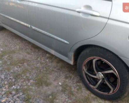 Синий Киа Черато, объемом двигателя 1.6 л и пробегом 250 тыс. км за 4500 $, фото 2 на Automoto.ua