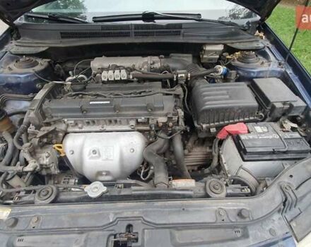 Синій Кіа Черато, об'ємом двигуна 2 л та пробігом 233 тис. км за 3900 $, фото 12 на Automoto.ua