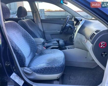 Синій Кіа Черато, об'ємом двигуна 2 л та пробігом 110 тис. км за 6390 $, фото 9 на Automoto.ua