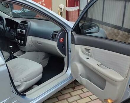 Синий Киа Черато, объемом двигателя 1.59 л и пробегом 161 тыс. км за 4200 $, фото 10 на Automoto.ua