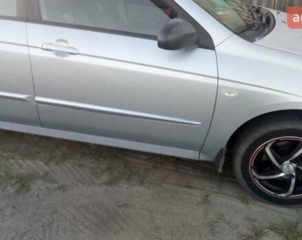 Синий Киа Черато, объемом двигателя 1.6 л и пробегом 250 тыс. км за 4500 $, фото 5 на Automoto.ua