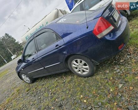 Синій Кіа Черато, об'ємом двигуна 1.98 л та пробігом 300 тис. км за 3900 $, фото 8 на Automoto.ua