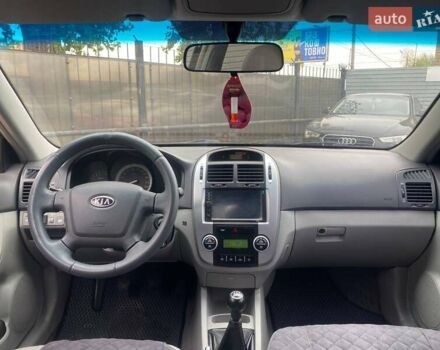 Синій Кіа Черато, об'ємом двигуна 2 л та пробігом 233 тис. км за 4690 $, фото 12 на Automoto.ua