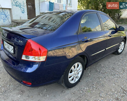 Синий Киа Черато, объемом двигателя 1.6 л и пробегом 150 тыс. км за 4500 $, фото 3 на Automoto.ua