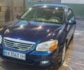 Синий Киа Черато, объемом двигателя 2 л и пробегом 300 тыс. км за 3800 $, фото 1 на Automoto.ua