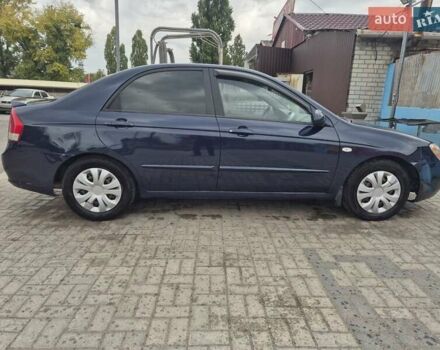 Синий Киа Черато, объемом двигателя 1.98 л и пробегом 252 тыс. км за 4200 $, фото 7 на Automoto.ua