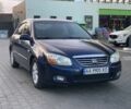 Синій Кіа Черато, об'ємом двигуна 2 л та пробігом 280 тис. км за 3999 $, фото 4 на Automoto.ua