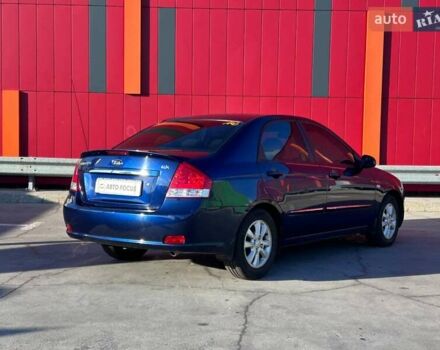 Синий Киа Черато, объемом двигателя 2 л и пробегом 110 тыс. км за 5790 $, фото 7 на Automoto.ua