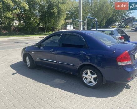 Синий Киа Черато, объемом двигателя 1.6 л и пробегом 255 тыс. км за 3300 $, фото 10 на Automoto.ua