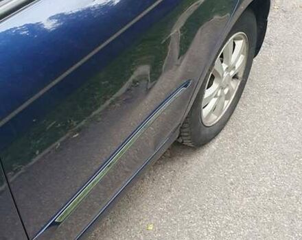 Синій Кіа Черато, об'ємом двигуна 2 л та пробігом 233 тис. км за 3900 $, фото 14 на Automoto.ua