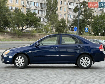 Синій Кіа Черато, об'ємом двигуна 2 л та пробігом 150 тис. км за 5799 $, фото 7 на Automoto.ua