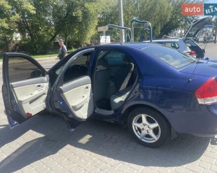 Синий Киа Черато, объемом двигателя 1.6 л и пробегом 255 тыс. км за 3300 $, фото 5 на Automoto.ua