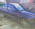 Синий Киа Черато, объемом двигателя 2 л и пробегом 200 тыс. км за 4600 $, фото 1 на Automoto.ua