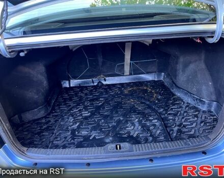 Синий Киа Черато, объемом двигателя 1.6 л и пробегом 183 тыс. км за 4500 $, фото 5 на Automoto.ua