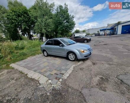 Синий Киа Черато, объемом двигателя 1.6 л и пробегом 255 тыс. км за 3300 $, фото 7 на Automoto.ua
