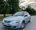 Синий Киа Черато, объемом двигателя 1.6 л и пробегом 230 тыс. км за 3450 $, фото 1 на Automoto.ua