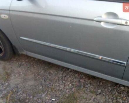 Синий Киа Черато, объемом двигателя 1.6 л и пробегом 250 тыс. км за 4500 $, фото 4 на Automoto.ua