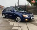 Синій Кіа Черато, об'ємом двигуна 2 л та пробігом 233 тис. км за 4690 $, фото 1 на Automoto.ua