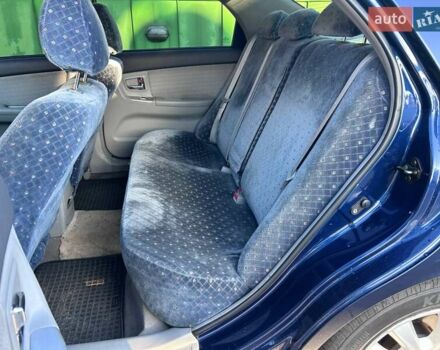 Синій Кіа Черато, об'ємом двигуна 2 л та пробігом 110 тис. км за 6390 $, фото 11 на Automoto.ua
