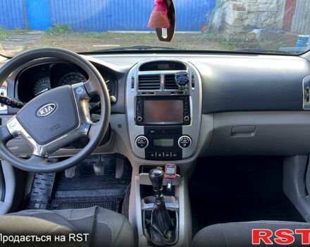 Синий Киа Черато, объемом двигателя 1.6 л и пробегом 183 тыс. км за 4500 $, фото 2 на Automoto.ua