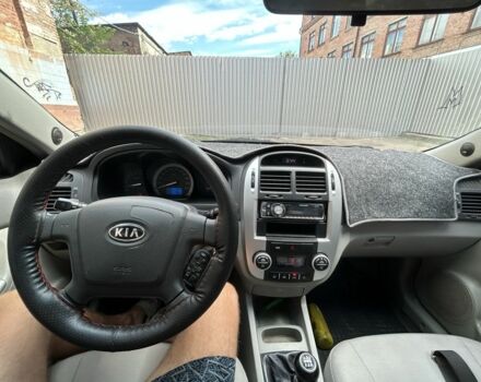 Синий Киа Черато, объемом двигателя 2 л и пробегом 270 тыс. км за 3500 $, фото 8 на Automoto.ua
