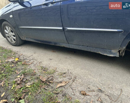 Синій Кіа Черато, об'ємом двигуна 1.6 л та пробігом 170 тис. км за 3700 $, фото 6 на Automoto.ua