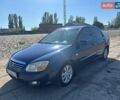 Синий Киа Черато, объемом двигателя 2 л и пробегом 280 тыс. км за 4100 $, фото 1 на Automoto.ua