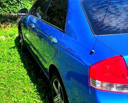 Синій Кіа Черато, об'ємом двигуна 1.6 л та пробігом 243 тис. км за 4500 $, фото 7 на Automoto.ua