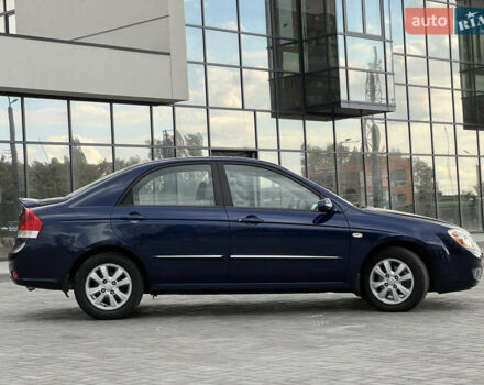 Синій Кіа Черато, об'ємом двигуна 2 л та пробігом 150 тис. км за 5799 $, фото 3 на Automoto.ua