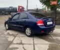 Синій Кіа Черато, об'ємом двигуна 2 л та пробігом 233 тис. км за 4690 $, фото 4 на Automoto.ua