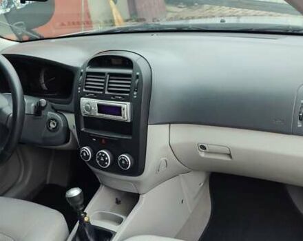 Синий Киа Черато, объемом двигателя 1.59 л и пробегом 161 тыс. км за 4200 $, фото 9 на Automoto.ua