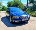 Синий Киа Черато, объемом двигателя 2 л и пробегом 218 тыс. км за 4650 $, фото 1 на Automoto.ua