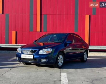 Синий Киа Черато, объемом двигателя 2 л и пробегом 110 тыс. км за 5790 $, фото 3 на Automoto.ua