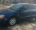 Синій Кіа Черато, об'ємом двигуна 2 л та пробігом 300 тис. км за 3800 $, фото 1 на Automoto.ua